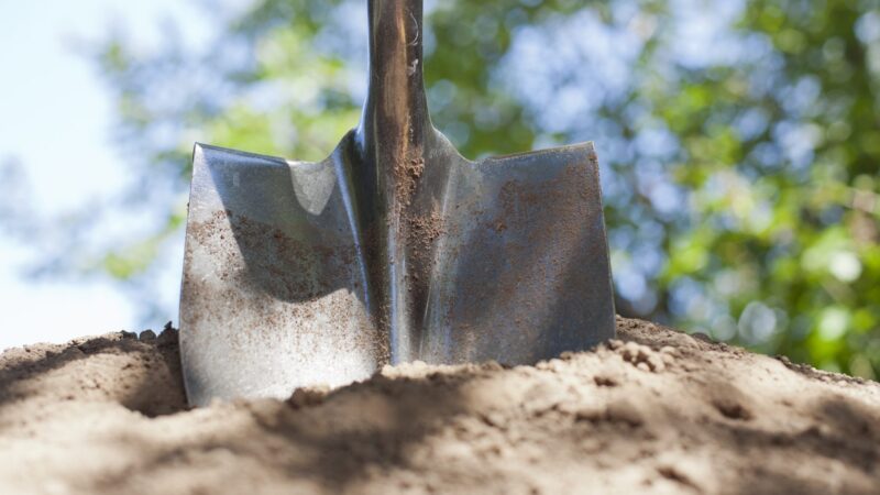 shovel in dirt new construction New England Wire Technologies