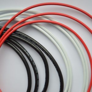 loose pile of black, red, and white power cables with UL markings